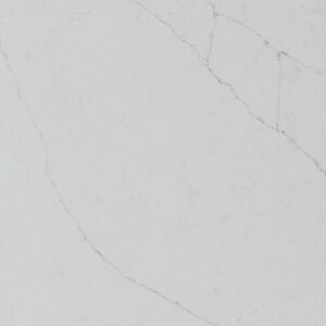 White marble surface with subtle grey veining running diagonally across a smooth, light background.