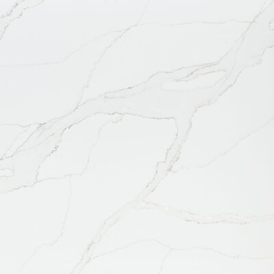 White marble surface with subtle grey veining running diagonally across a smooth, polished background.