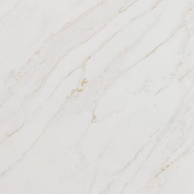 White marble surface with subtle beige and gray veining, creating a smooth, elegant texture.