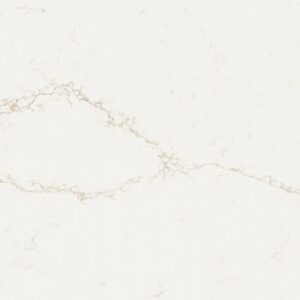 White marble surface with subtle pale gray and beige veining in a natural, irregular pattern.