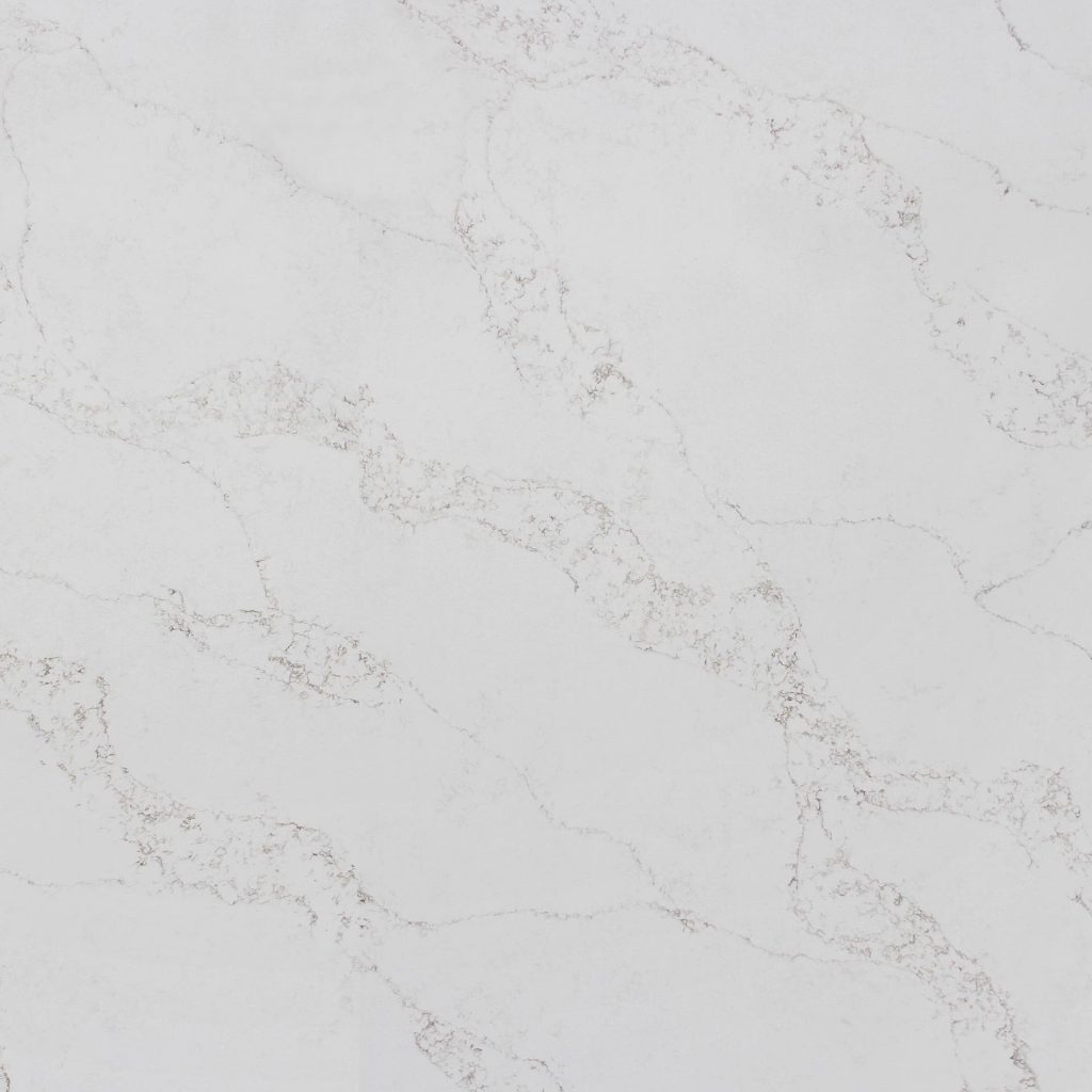 White marble surface with light gray veining, creating a subtle and elegant natural stone pattern.