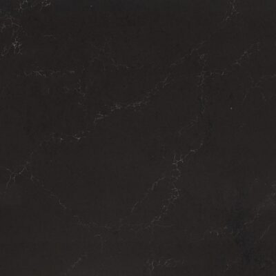 Black marble surface with subtle white veins running throughout.