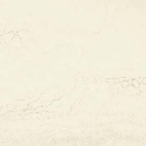 Light beige marble surface with subtle gray veining and a smooth, polished texture.