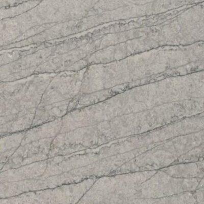 Light gray marble surface with wavy, thin darker gray veining running diagonally across the stone.