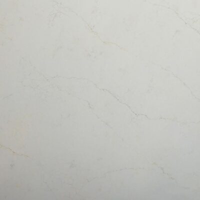 Light beige marble surface with subtle, thin, grayish veins running across it.