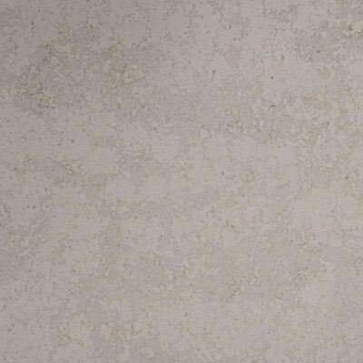 Light gray textured stone surface with subtle speckles and natural, uneven patterns throughout.
