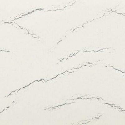 White marble surface with thin, gray veining patterns running diagonally across the background.