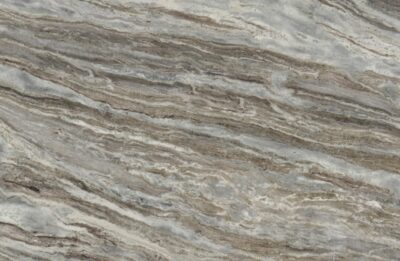 Gray and beige marble surface with wavy, layered patterns and natural stone textures.